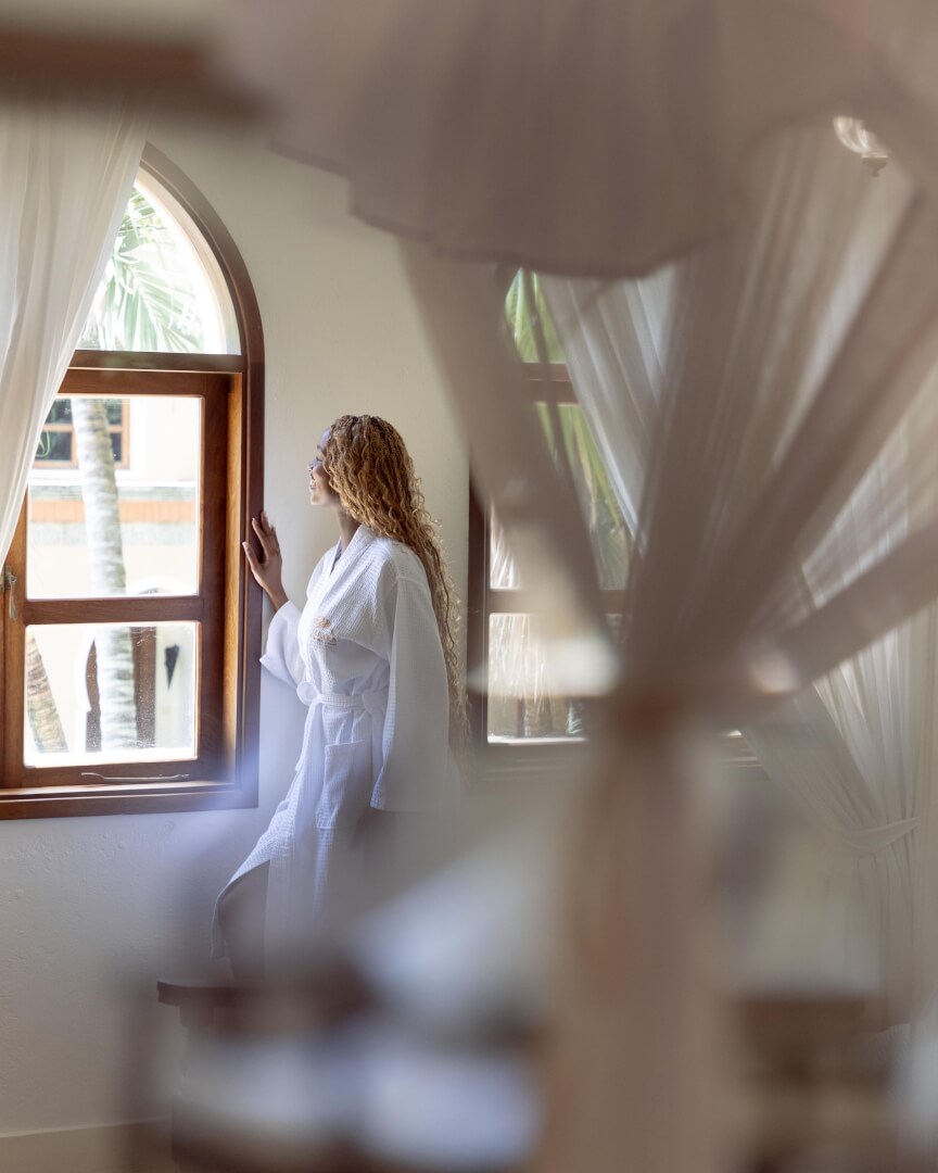Master bedroom with canopy bed inside Almanara Garden Villa
