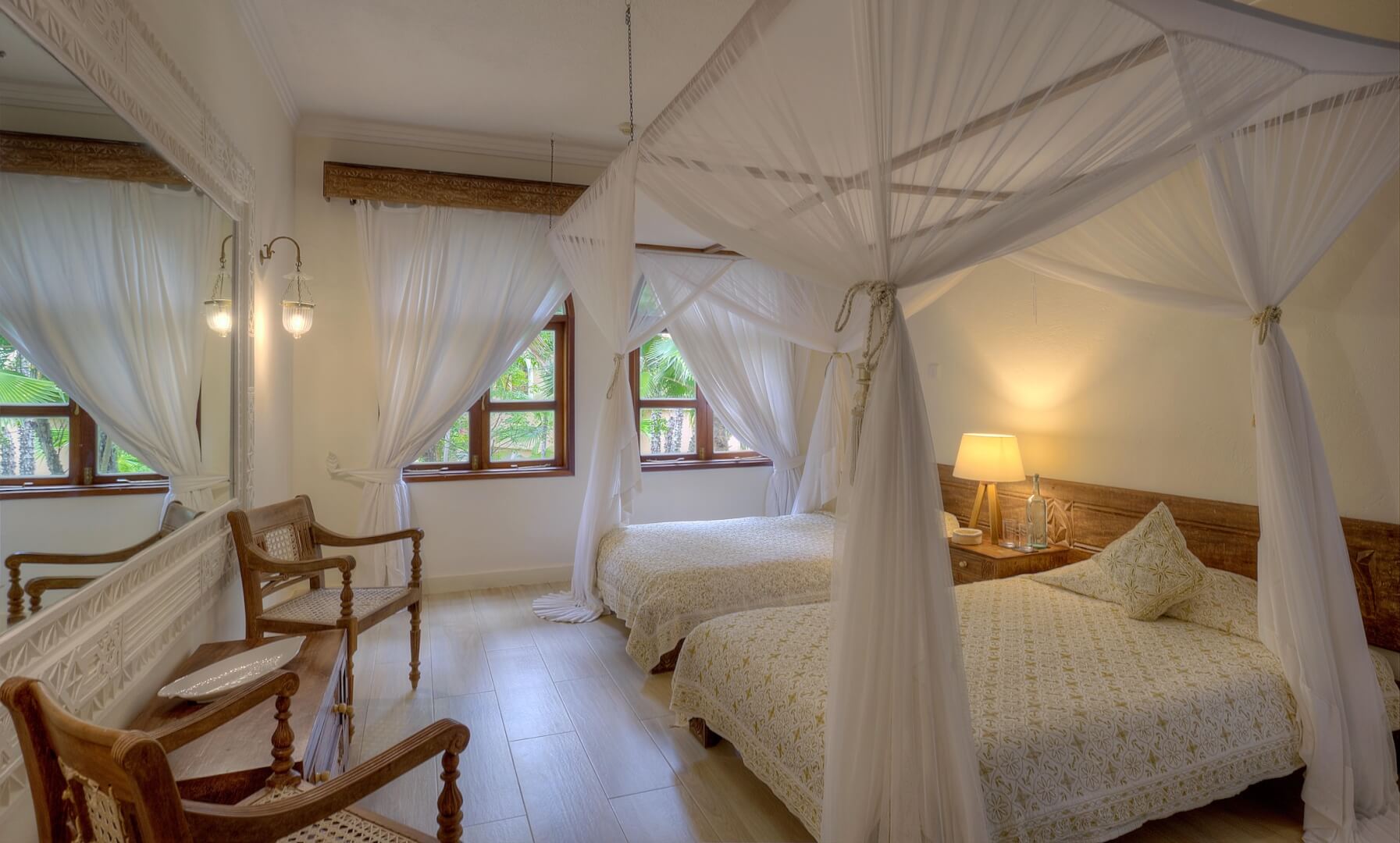 Twin bedroom with canopy bed inside Almanara Garden Villa