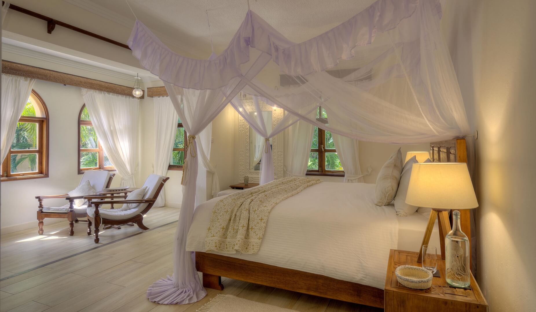 Master bedroom with canopy bed inside Almanara Garden Villa
