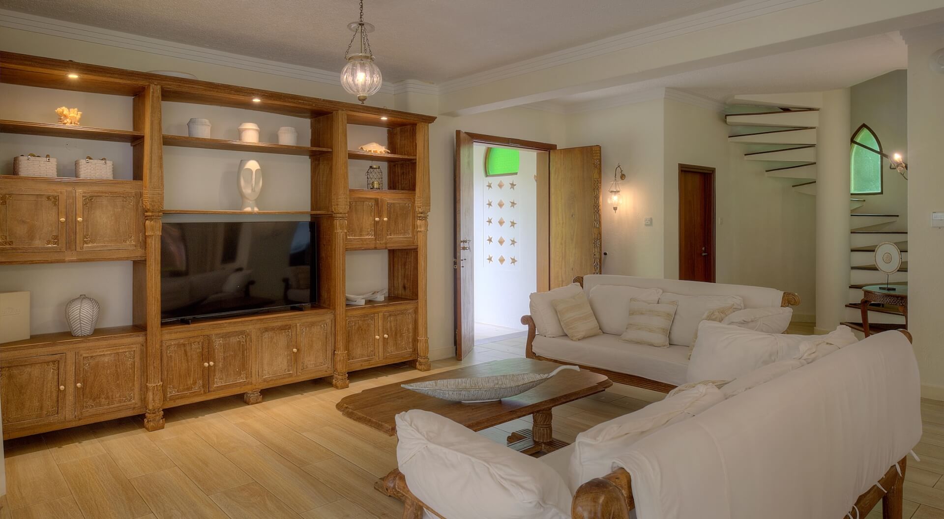 Open-plan living and dining area in the Garden Villa at Almanara, Diani Beach